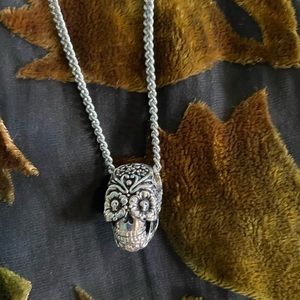 Lost Apostle sterling silver sugar skull necklace.
